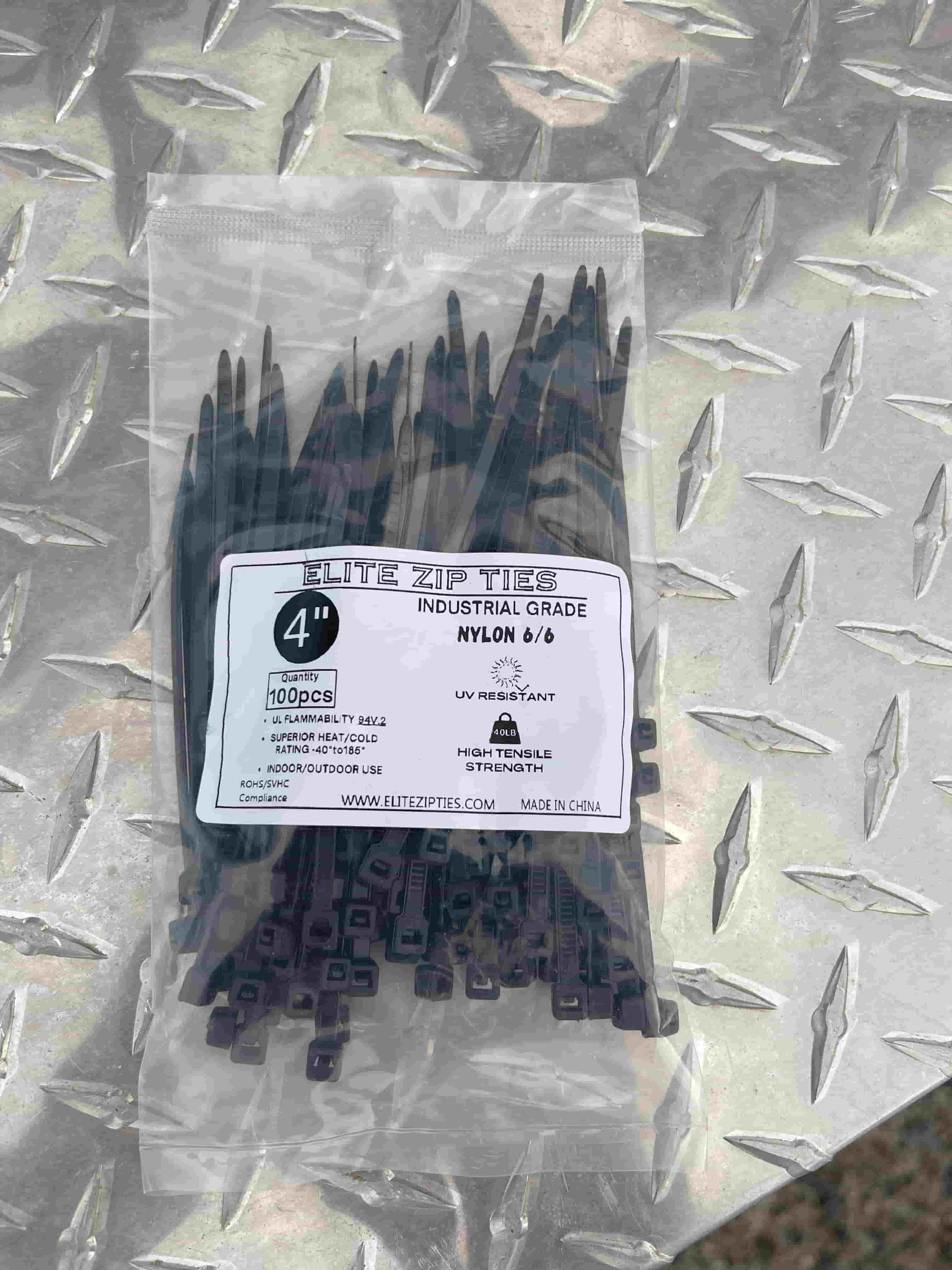 4-inch black cable ties in a 1000 pack from Elite Zip Ties, packaged on a metal background, showing product details and industrial grade.