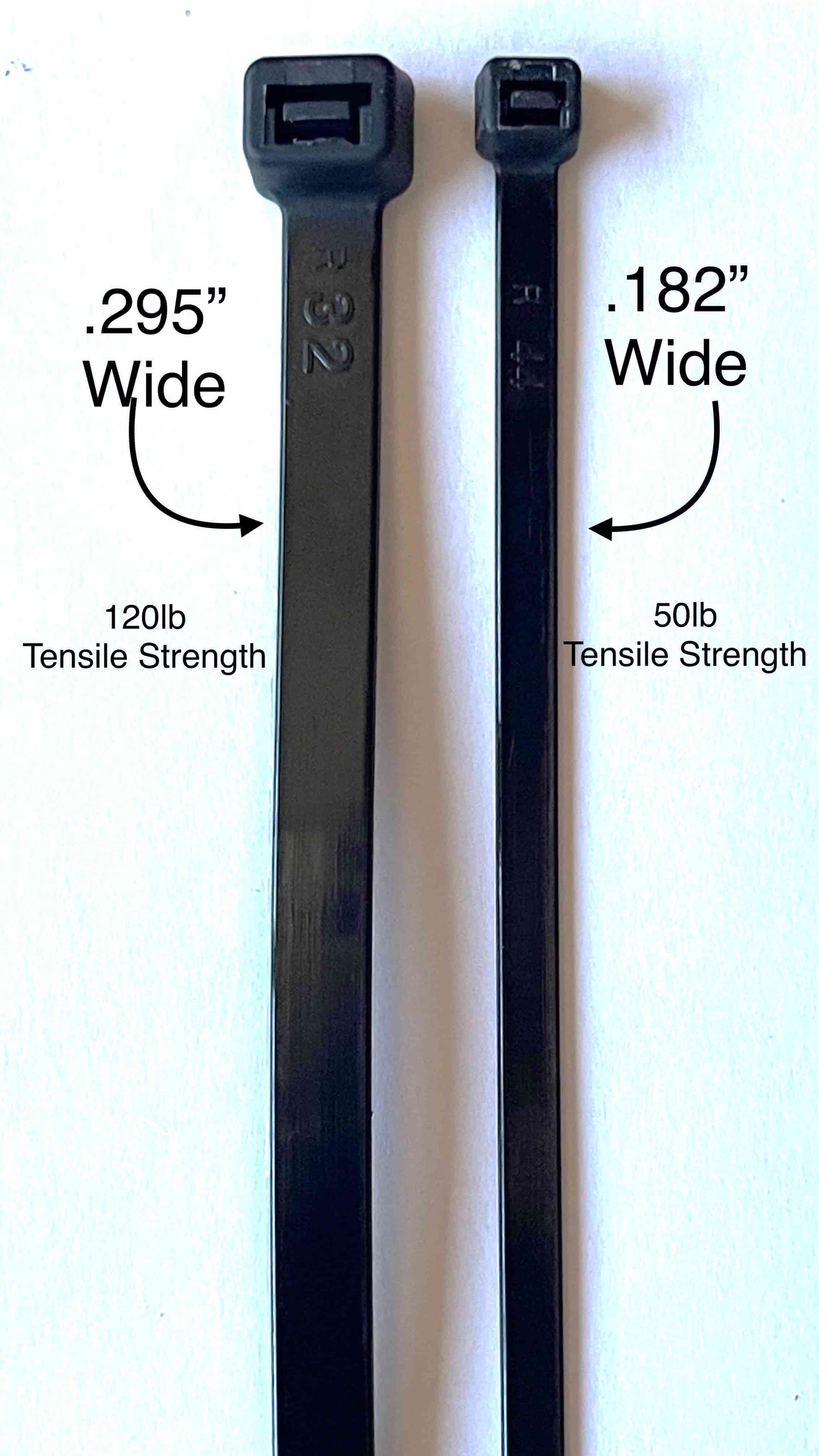 Comparison of 12-inch 120lb and 50lb zip ties, demonstrating the difference in width and tensile strength for various applications.